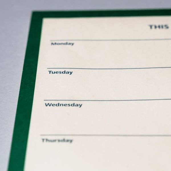 A calendar with marked days symbolizing a consistent routine.