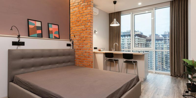 Interior of a serene and spacious studio with natural light.